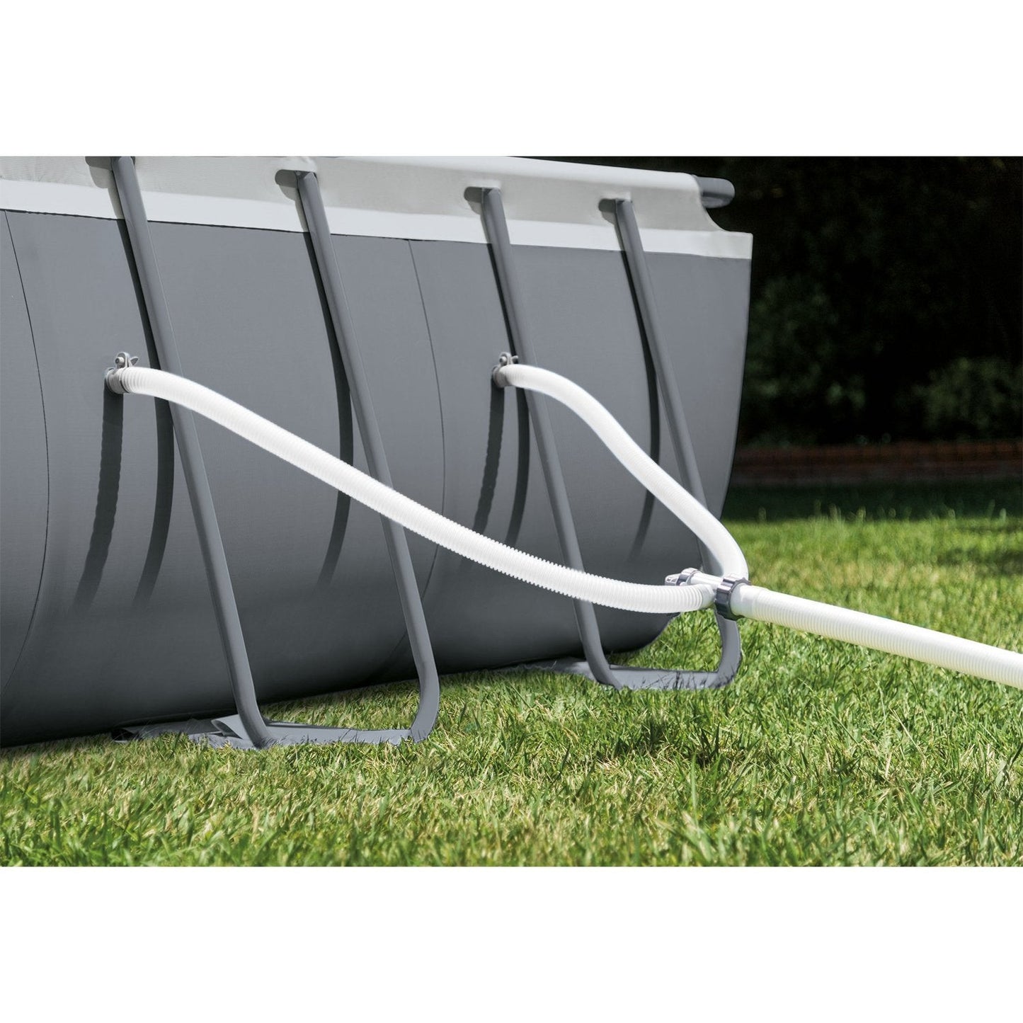 A 32-foot by 16-foot by 52-inch rectangular super-large swimming pool equipped with a water pump